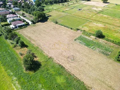 Na predaj pozemok, Budimír