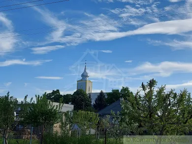 Na predaj pozemok, Moča