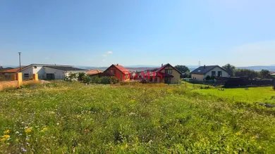 Na predaj pozemok, Budimír