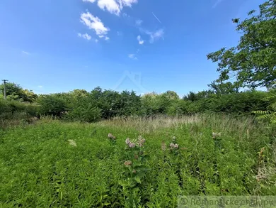 Na predaj pozemok, 125 m², Moča