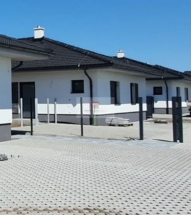 Na predaj dom v Láb · €312 000 · Novostavba